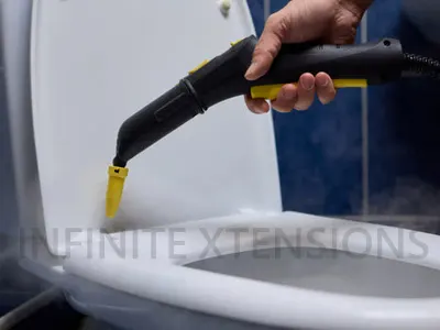 Toilet and bathroom cleaning services in Pune with professional cleaning machines by Infinite Xtensions